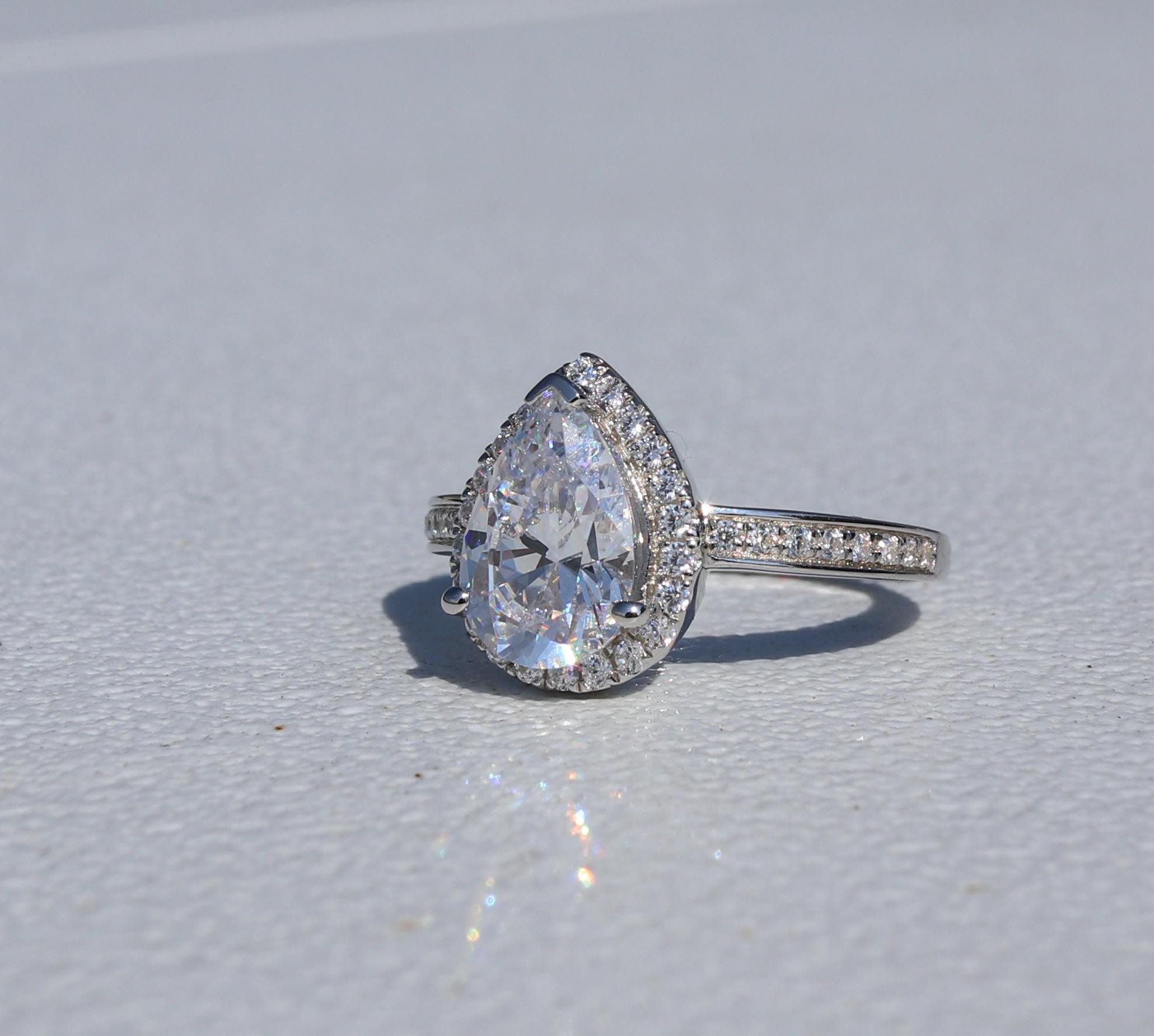 Pear Shape 2 Carat Diamond Simulant with Halo- Cardi Ring